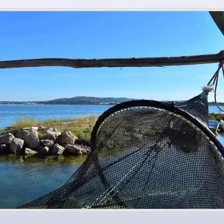 Maison Quartier Pointe-courte à *